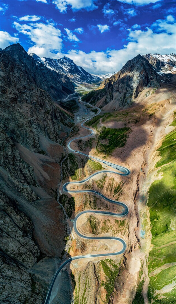 Engineering Against Nature: Tianshan Highway Winter-to-Summer Transition