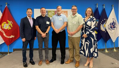 Photo Cutline: (From Left to Right) Brad Tolkin, Co-Chairman and Co-CEO of World Travel Holdings Inc.; U.S. Army Veteran Josh Bauer of Saint Cloud, Minn.; U.S. Army Veteran David Conklin of Spring, Texas; U.S. Navy Veteran Jonathan Oringdulph of Elkins, W.Va.; Debbie Fiorino, Chief Operating Officer of Dream Vacations.