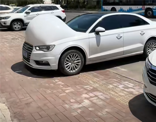 Vehicles with heat-induced protective film bubbles