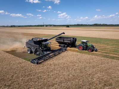 This image, taken during the 2024 AGCO Tech Day, shows PTx Trimble’s OutRun solution in action: an autonomous Fendt tractor pulls a grain cart alongside an IDEAL combine during offloading. AGCO’s upcoming Tech Day will be held at Götz Agrardienst farm in Markt Indersdorf, Germany, September 30–October 1, 2025.