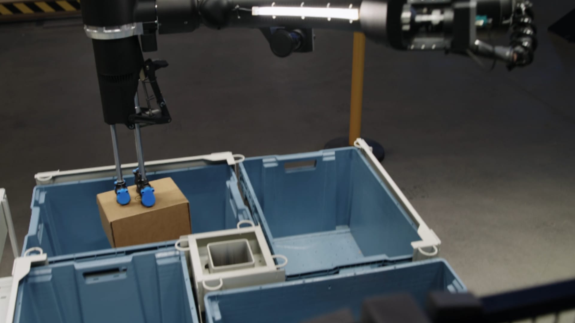 Amazon Debuts 'Blue Jay' Robot Capable of Multitasking